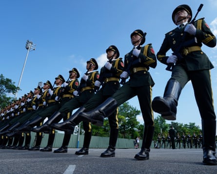 Chinese soldiers rehearse at a camp before the parade