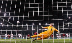 Portugal’s Francisco Trincaosends Aaron Ramsdale the wrong way from the penalty spot to score his side’s second goal of the 2-0 win.