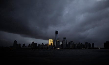 The skyline of lower Manhattan is mostly in darkness except for the Goldman Sachs building after a preventive power outage caused by giant storm Sandy, in New York on 30 October 2012.