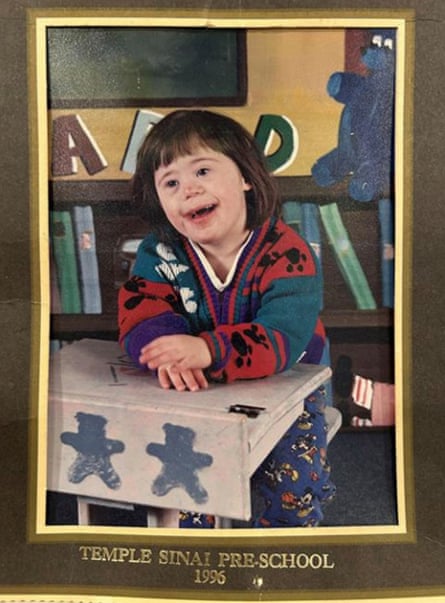 a girl smiles for a school photo