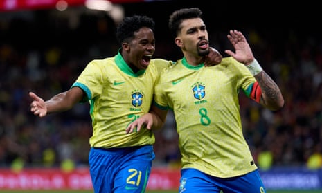 Lucas Paquetá celebrates Brazil’s injury-time equaliser against Spain with Endrick.