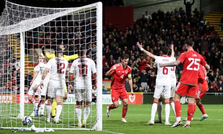 Ben Davies celebrates scoring the opening goal for Wales