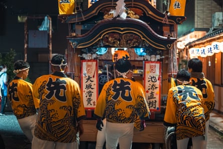 Men pushing a Danjiri festival float in Anan, Tokushima.