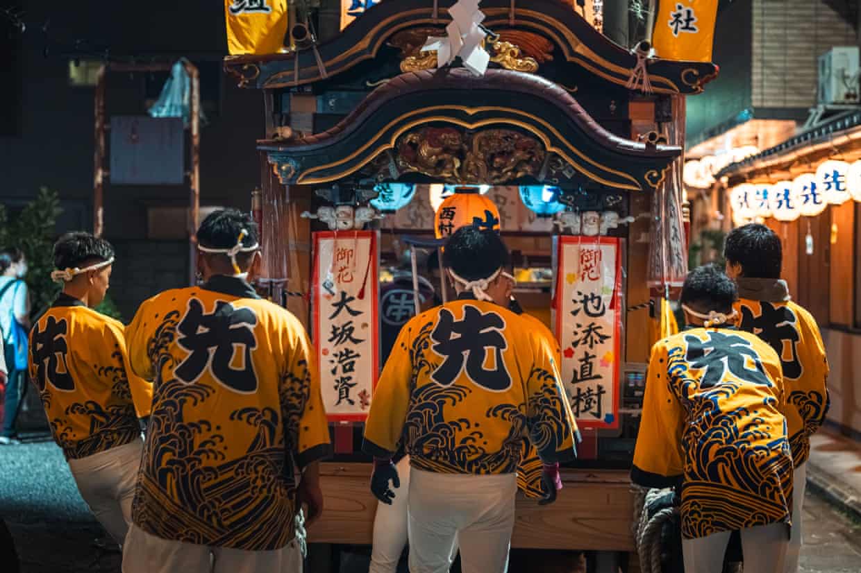 Men pushing a Danjiri festival float in Anan, Tokushima.
