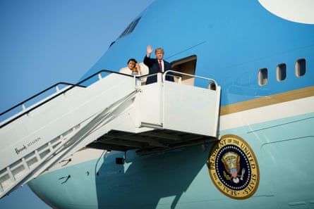 Donald Trump and Melania Trump board Air Force One at Stansted airport on route to Scotland.