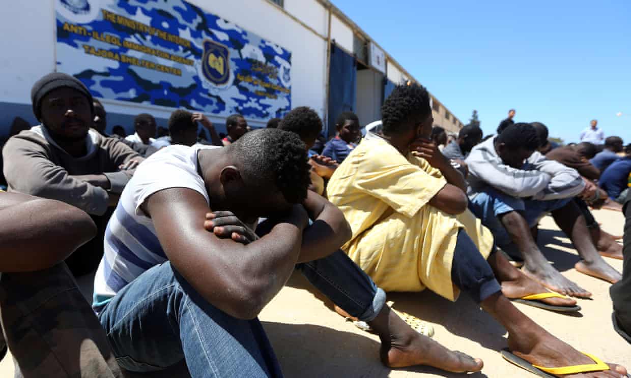 Migrants gather at the Tajoura detention centre in Tripoli.