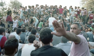 Kara Tepe refugee camp on Lesbos in Greece. The men, mostly Syrians, are waiting for registration papers, July 2015