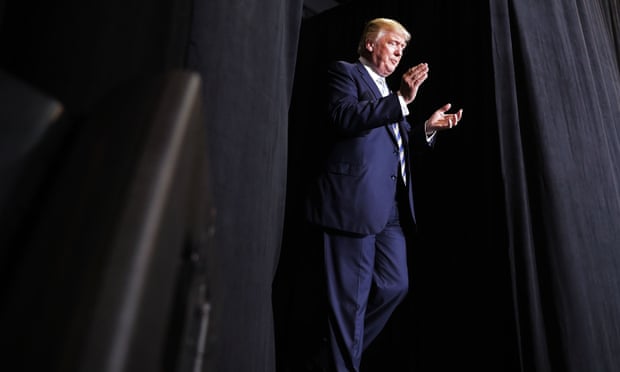  Donald Trump on stage in Sarasota, Florida. With less than 24 hours until election day, the Republican is on a whirlwind schedule of swing states. Photograph: Chip Somodevilla/Getty Images