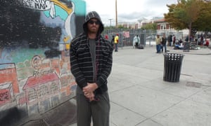 A man stands by the men’s side of the Road Home shelter in Salt Lake City.