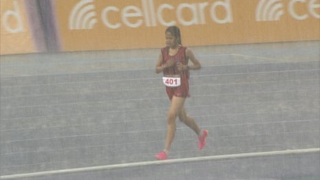 Hitting the squall: Cambodian runner refuses to quit race despite huge storm – video
