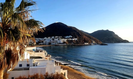 San Jose bay with palm trees and white-washed houses