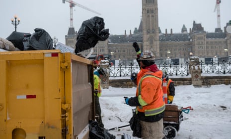 A city employee cleans up Wellington Street in front of Parliament Hill, Ottawa, Canada which was previously occupied by the ‘Freedom Convoy’,