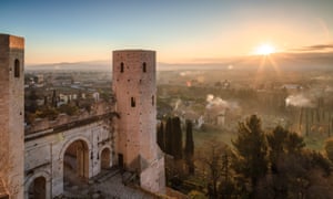 The medieval gates of Spello, with views of the Valle Umbra