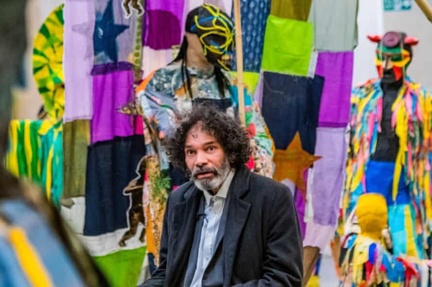 The artist among his new works.