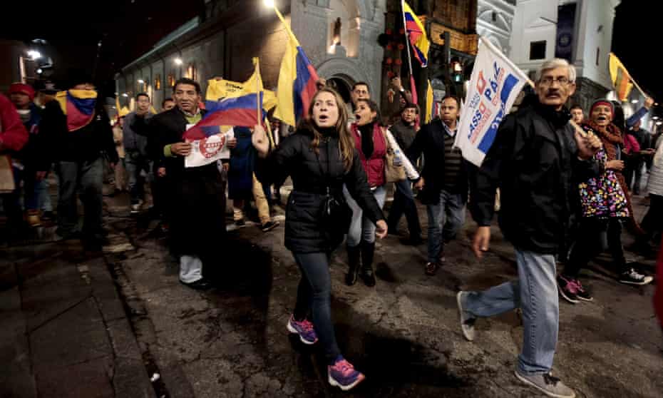 Ecuadorian demonstrators march in protest against the presidential election results last week.
