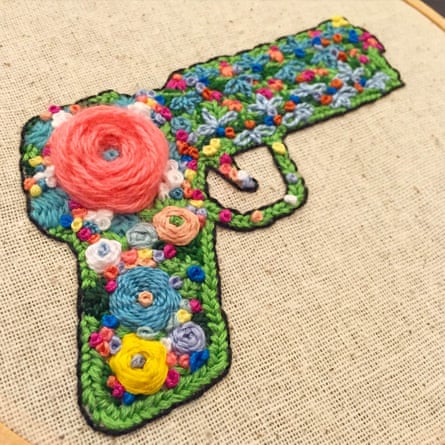 a colorful embroidered gun