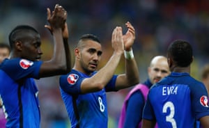 The French players applaud the supporters after the match.