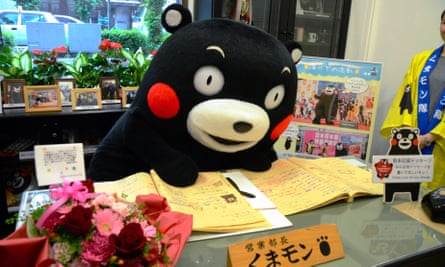 Kumamon reads his correspondence in his office in Kumamon Square in Kumamoto