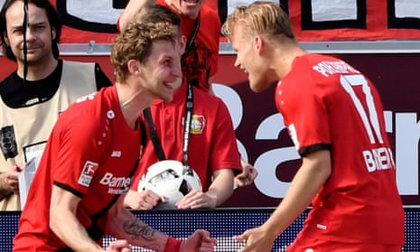 Leverkusen’s Joel Pohjanpalo, right, celebrates with Stefan Kiessling after equalising to make it 2-2 against Köln.