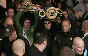 Fellow Manchester City fans Liam and Noel Gallagher walk in with Hatton’s belts at Las Vegas’s MGM Grand Hotel before the IBF light-welterweight fight against Paul Malignaggi in November 2008
