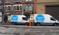 Two Thames Water vans attending an incident parked on a street