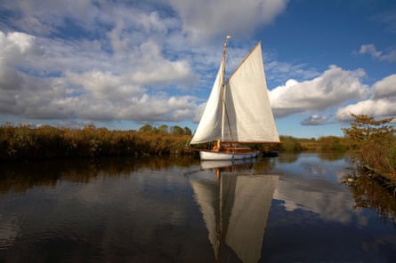 Traditional wherry sailing pleasure boat on the Norfolk Broads.