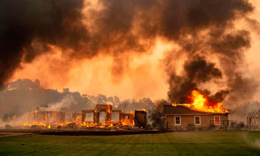 A building engulfed in flames at a vineyard during the 2019 Kincade fire in California.
