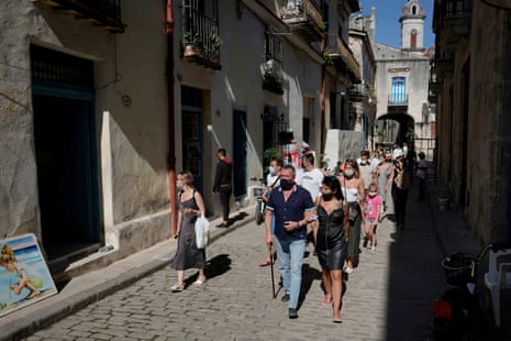 Tourists from Russia, staying in a beach resort, walk in downtown during a day trip to Havana, Cuba, on 6 January, 2021.