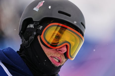 Gus Kenworthy looks on during the men's freestyle skiing halfpipe qualifications