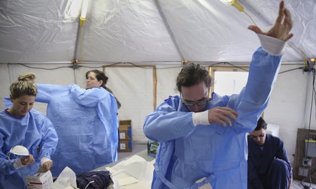 Philadelphia Medical Reserve Corps volunteer nurses prepare to work at a coronavirus testing site.