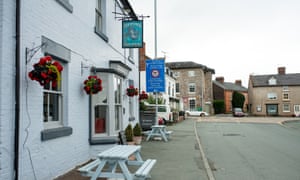 Coronavirus - Mon Jun 29, 2020The Dolphin, in Wales, (L) and the Cross Keys, in England, (R) in Llanymynech, where the border for England and Wales runs along the A483. Drinking establishments on one side of the A road such as The Cross Keys and The Bradford Arms will welcome customers on Saturday 4th July, however The Dolphin, a pub yards inside the Welsh border remains closed. PA Photo. Picture date: Monday June 29, 2020. See PA story HEALTH Coronavirus Llanymynech. Photo credit should read: Jacob King/PA Wire