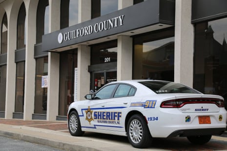 A sheriff's car outside the Guilford county municipal building