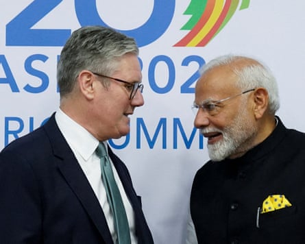 Keir Starmer talks to Narendra Modi at the Museum of Modern Art in Rio de Janeiro