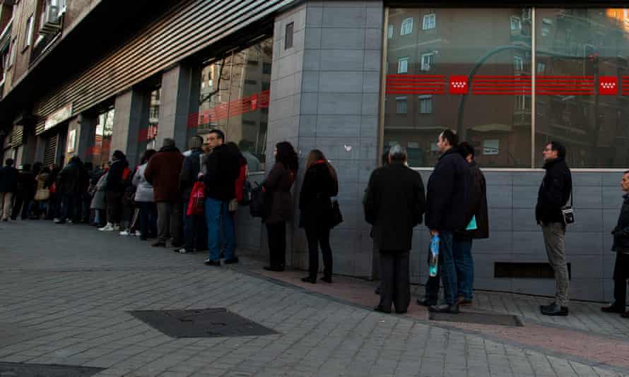A queue outside an unemployment office in Madrid.