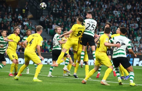 Sporting’s Gonçalo Inácio heads in the opening goal of the game.