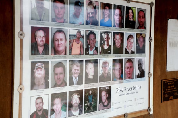 Photos of the 29 deceased miners are shown on display at the public memorial on the access road to the Pike river mine.