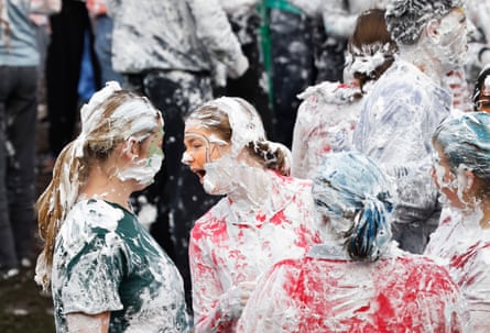 Several students covered in foam