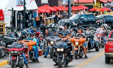 Motorcyclists ride down Main Street in Sturgis on Thursday. South Dakota has fared better than most states but cases have increased recently.