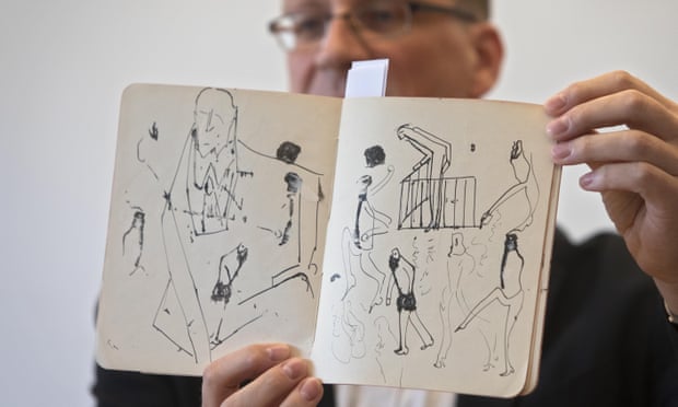 Archivist Stefan Litt shows drawings from one of Franz Kafka’s notebooks. 