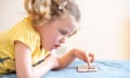 Three year old girl using an iPhone, UK<br>P9JCRG Three year old girl using an iPhone, UK