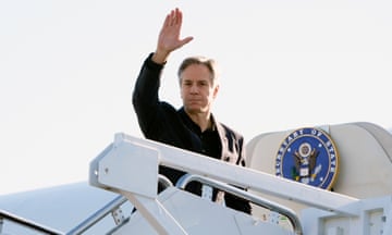 US Secretary of State Antony Blinken waves as he boards his plane at Joint Base Andrews in Maryland, on his way to Beijing for his three-day visit to China
