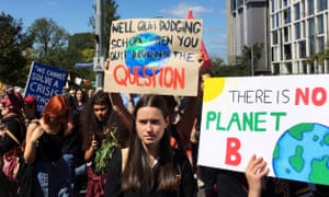 Protesters demanding action on the climate emergency gather in Melbourne.