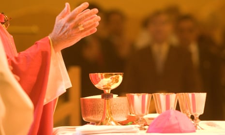 A Catholic priest celebrates Holy Communion