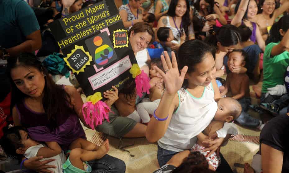 Women breastfeed their children in suburban Manila at the start of August last year to celebrate national breastfeeding awareness month.