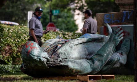 Statue of Confederate general Albert Pike after it was toppled and defaced near Judiciary Square the previous night following a day of Juneteenth celebrations in Washington DC, on 20 June.