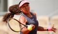Japan's Naomi Osaka plays a shot against Italy's Lucia Bronzetti during their first round match of the French Open tennis tournament at the Roland Garros stadium in Paris, Sunday, May 26, 2024. (AP Photo/Christophe Ena)