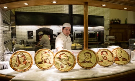 Pizzas with the faces of presidential candidates are shown at the Los 36 Billares pizza restaurant, in Buenos Aires earlier this month.