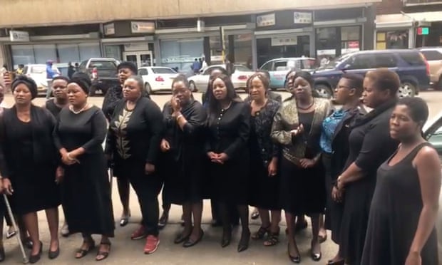 Women in Harare wear black in protest against alleged sexual violence by Zimbabwe's military forces