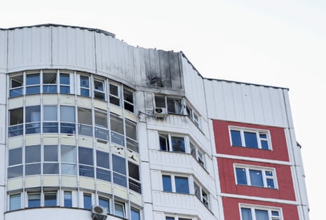 A damaged multi-storey apartment block seen following a reported drone attack in Moscow.