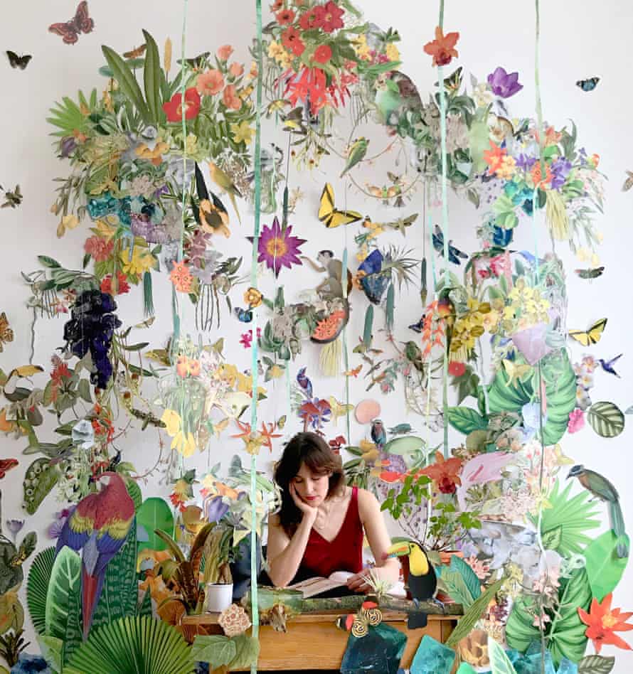 Clare Celeste with another of her works, titled The Garden